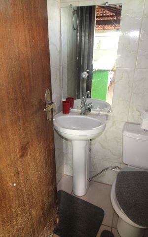 Casa à venda com 511m², 4 quartos e 4 vagasBanheiro da Área gourmet