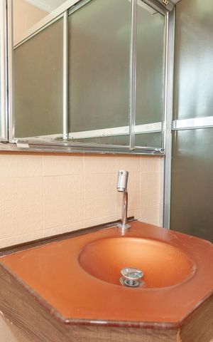 Casa à venda com 420m², 4 quartos e 6 vagasBanheiro da Suíte 2
