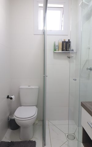 Apartamento à venda com 66m², 2 quartos e 2 vagasBanheiro da Suíte