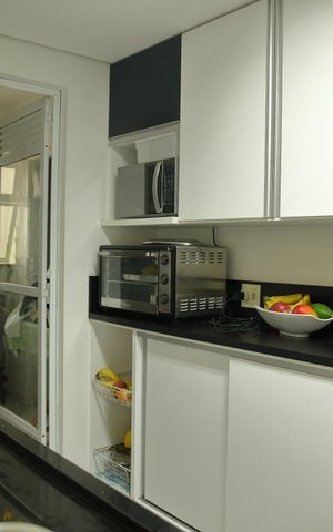 Apartamento à venda com 104m², 2 quartos e 2 vagasCozinha
