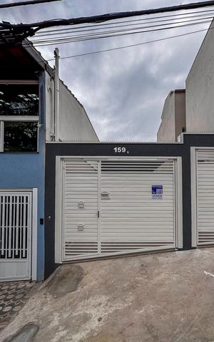 Casa à venda com 77m², 3 quartos e 2 vagas Casa à venda com 77m², 3 quartos e 2 vagasFachada