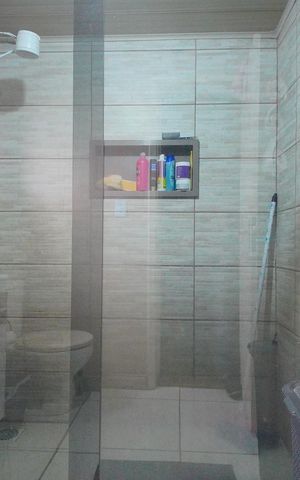 Casa à venda com 165m², 3 quartos e 2 vagasBanheiro