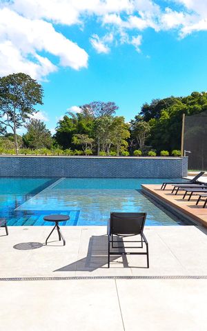 Casa de condomínio à venda com 359m², 4 quartos e 4 vagas Casa de condomínio à venda com 359m², 4 quartos e 4 vagasÁrea comum - Piscina