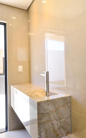 Casa de condomínio à venda com 359m², 4 quartos e 4 vagas Casa de condomínio à venda com 359m², 4 quartos e 4 vagasLavabo