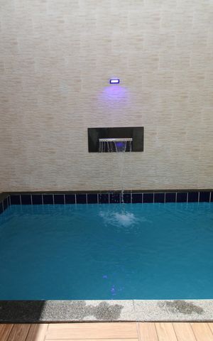 Casa à venda com 320m², 4 quartos e 2 vagasÁrea comum - Piscina