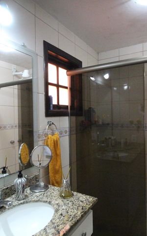 Casa de condomínio à venda com 70m², 3 quartos e 1 vagaBanheiro da suíte