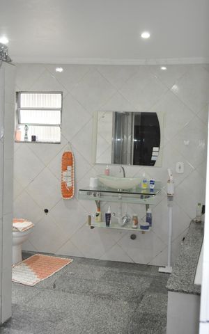 Casa à venda com 240m², 4 quartos e sem vagaBanheiro da Suíte