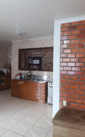 Casa à venda com 350m², 5 quartos e 2 vagasSala/Cozinha Casa 2