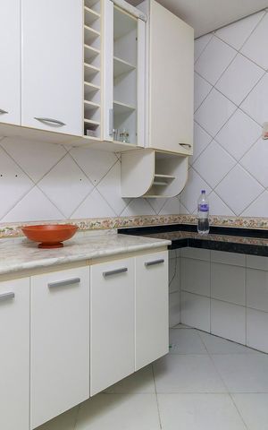 Casa à venda com 191m², 4 quartos e 4 vagas Casa à venda com 191m², 4 quartos e 4 vagasCozinha
