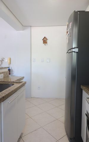 Apartamento à venda com 60m², 2 quartos e 1 vagaCozinha e Área de Serviço