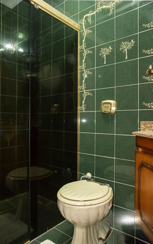 Casa à venda com 250m², 3 quartos e 3 vagasBanheiro