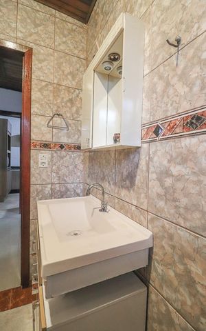 Casa à venda com 152m², 3 quartos e 3 vagasBanheiro