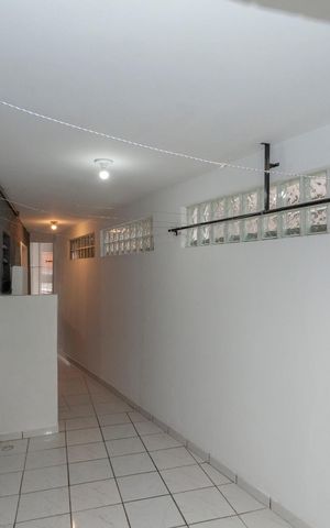 Casa à venda com 400m², 7 quartos e 2 vagasÁrea de Serviços Casa 1