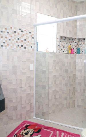 Casa à venda com 244m², 3 quartos e 2 vagasBanheiro