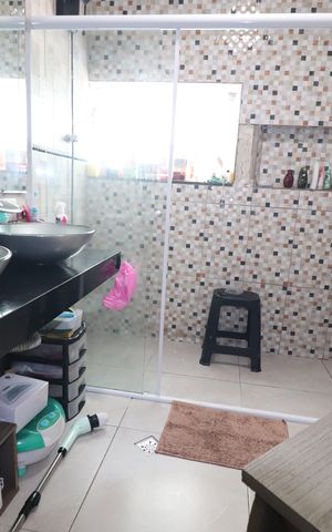 Casa à venda com 244m², 3 quartos e 2 vagasBanheiro da Suíte