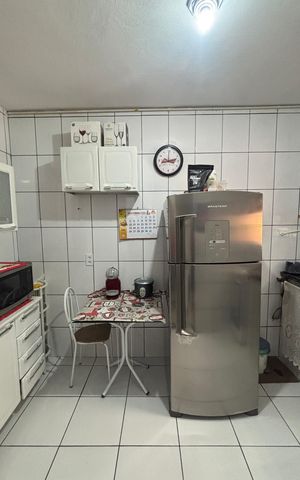 Casa à venda com 100m², 3 quartos e 2 vagas Casa à venda com 100m², 3 quartos e 2 vagasCozinha