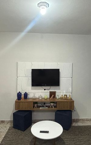 Casa à venda com 100m², 3 quartos e 2 vagas Casa à venda com 100m², 3 quartos e 2 vagasSala