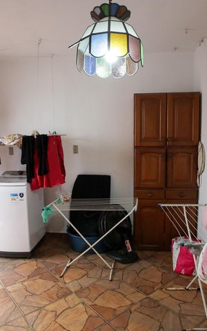 Casa à venda com 318m², 5 quartos e 2 vagasLavanderia