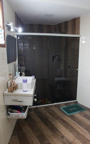 Casa à venda com 318m², 5 quartos e 2 vagasBanheiro da Suíte 1