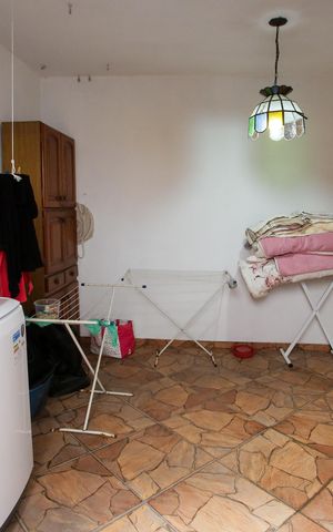 Casa à venda com 318m², 5 quartos e 2 vagasLavanderia