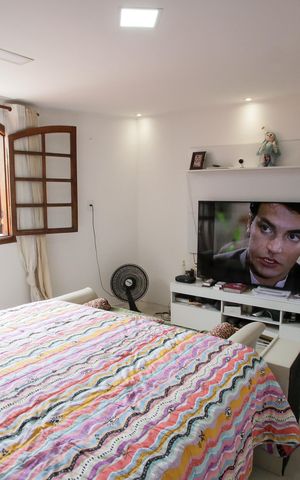 Casa à venda com 318m², 5 quartos e 2 vagasQuarto Suíte 1