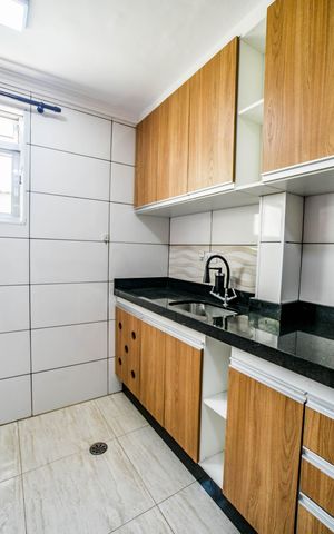 Apartamento à venda com 53m², 2 quartos e 1 vaga Apartamento à venda com 53m², 2 quartos e 1 vagaCozinha e Área de Serviço