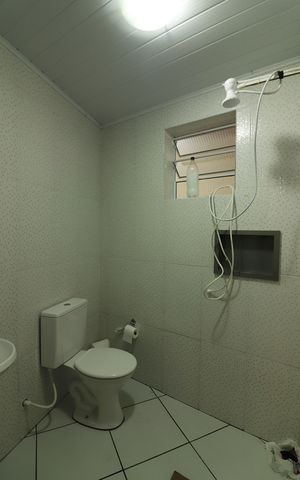 Casa à venda com 382m², 3 quartos e 6 vagasBanheiro de serviço