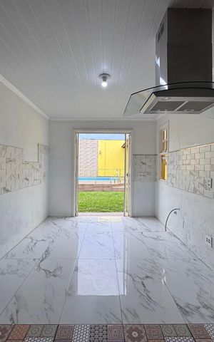 Casa à venda com 150m², 3 quartos e 3 vagas Casa à venda com 150m², 3 quartos e 3 vagasCozinha