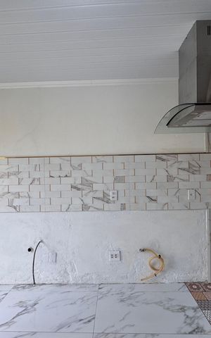 Casa à venda com 150m², 3 quartos e 3 vagas Casa à venda com 150m², 3 quartos e 3 vagasCozinha