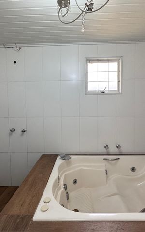 Casa à venda com 150m², 3 quartos e 3 vagas Casa à venda com 150m², 3 quartos e 3 vagasBanheiro da Suíte