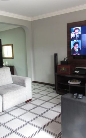 Casa à venda com 245m², 4 quartos e 3 vagasSala