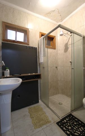 Casa à venda com 392m², 3 quartos e 2 vagasBanheiro da Suíte