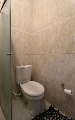Casa à venda com 392m², 3 quartos e 2 vagasBanheiro da Suíte