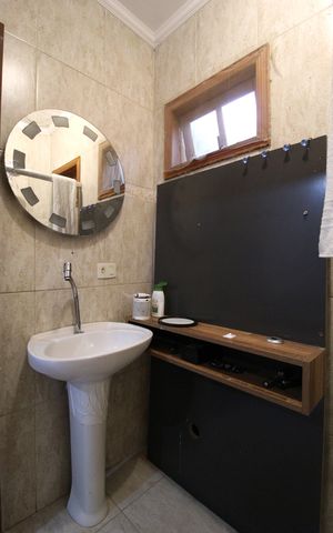 Casa à venda com 392m², 3 quartos e 2 vagasBanheiro da Suíte
