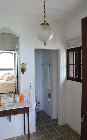 Casa de condomínio à venda com 461m², 4 quartos e 2 vagas Casa de condomínio à venda com 461m², 4 quartos e 2 vagasBanheiro da Suíte 1