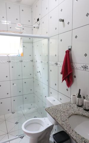 Casa à venda com 125m², 4 quartos e 2 vagasBanheiro 3