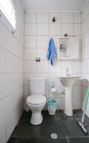 Casa à venda com 250m², 5 quartos e 3 vagasBanheiro da edícula