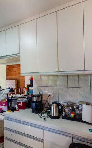 Casa à venda com 133m², 3 quartos e 2 vagas Casa à venda com 133m², 3 quartos e 2 vagasCozinha