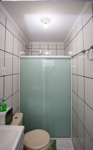 Casa à venda com 48m², 3 quartos e 2 vagasBanheiro de Serviço
