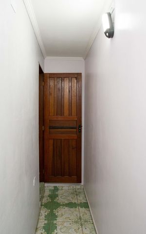 Casa à venda com 48m², 3 quartos e 2 vagasCorredor