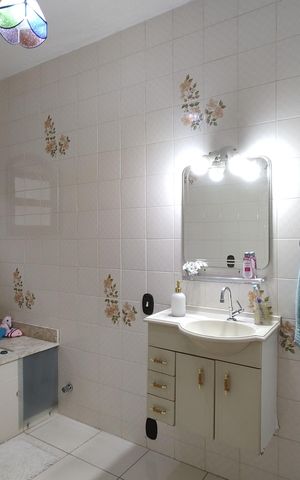 Casa de condomínio à venda com 330m², 4 quartos e 3 vagasBanheiro da Suíte