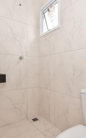 Casa de condomínio à venda com 80m², 2 quartos e 2 vagasBanheiro Suíte 1