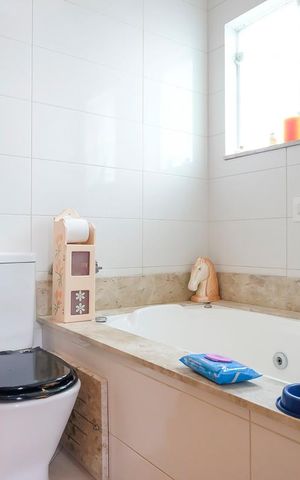 Casa à venda com 249m², 3 quartos e 3 vagasBanheiro da Suíte 1