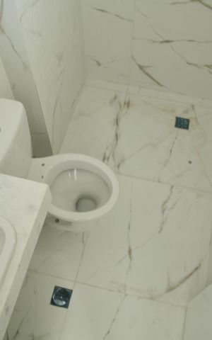 Apartamento à venda com 69m², 2 quartos e 2 vagasBanheiro da Suíte