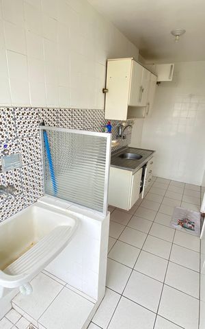 Apartamento à venda com 45m², 2 quartos e 1 vaga Apartamento à venda com 45m², 2 quartos e 1 vagaCozinha e Área de Serviço