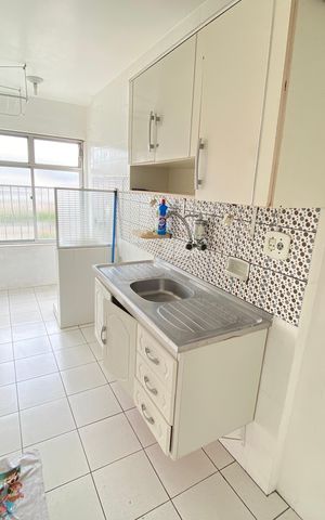 Apartamento à venda com 45m², 2 quartos e 1 vaga Apartamento à venda com 45m², 2 quartos e 1 vagaCozinha e Área de Serviço