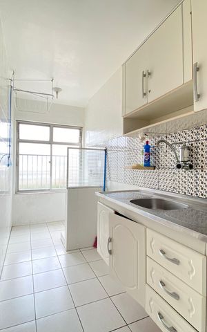 Apartamento à venda com 45m², 2 quartos e 1 vaga Apartamento à venda com 45m², 2 quartos e 1 vagaCozinha e Área de Serviço