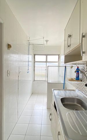 Apartamento à venda com 45m², 2 quartos e 1 vaga Apartamento à venda com 45m², 2 quartos e 1 vagaCozinha e Área de Serviço