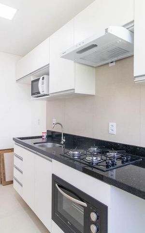 Apartamento para alugar com 65m², 2 quartos e 1 vagaCozinha e Área de Serviço