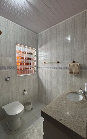 Casa à venda com 220m², 4 quartos e 3 vagas Casa à venda com 220m², 4 quartos e 3 vagasBanheiro da Suíte 1